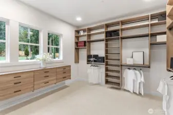 This is what dreams are made of. Enormous Primary closet with built in shelving provides ample storage.