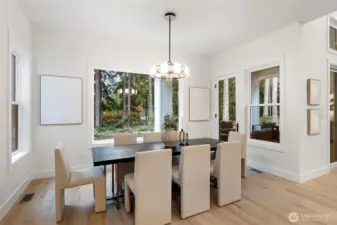 The large windows bring the outdoors, in.