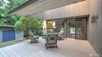 Relax or entertain on this expansive covered deck, offering privacy and a seamless connection to nature.