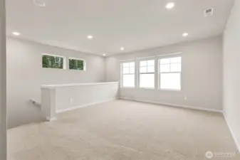 loft at the top of the stairs for extra entertaining space