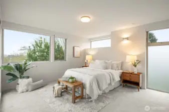 Spacious primary bedroom overlooking Madison Valley