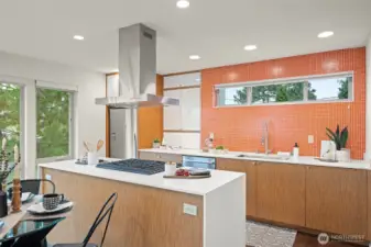 Beautiful waterfall quartz island and stainless steel appliances