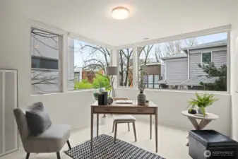 Great office option for this bedroom wrapped in windows