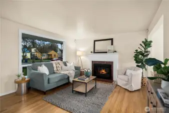 Cozy up to the wood burning fireplace with new glass doors.