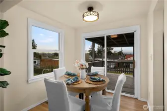 The dining room leads out to the large covered back deck.