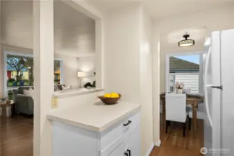 The kitchen has a pass through window and two access points.