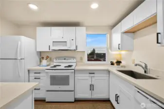 Newer cabinets and countertops.