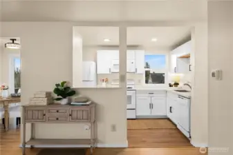 Notice the pass through window from the living room to the kitchen.