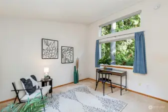 Second bedroom with its transom window provides nice view and natural light.  Would work well as a office and/or hobby room.