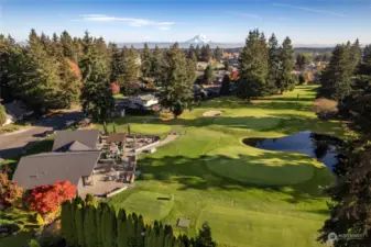 Highland public 9 hold golf course with clubhouse.