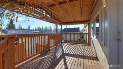 Massive, custom-built cedar deck with a cover for year round enjoyment!