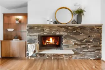 Fireplace and built-in shelves.