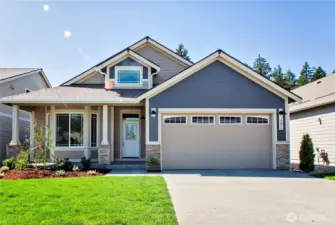 Lot 82, the Redwood rambler. 3 bed, 2 bath 1942 sq ft. Photo from similar plan on different lot for reference only