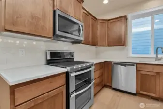 Double ovens are standard in all homes! Photo from similar plan on a different lot