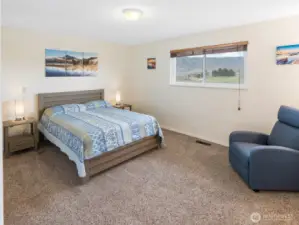 Primary bedroom with golf course views.