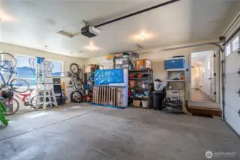 two car garage and plenty of driveway and street parking