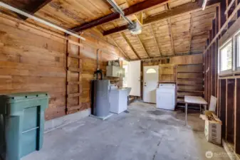 Garage, door to backyard, utility area