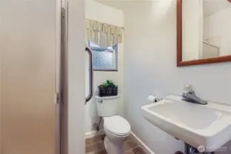 Convenient 3/4 bath with walk-in shower and natural light