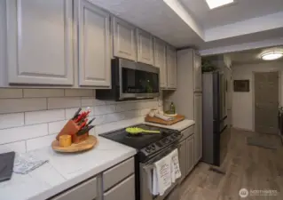 New cabinets, counters, paint, flooring