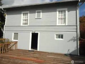 Back door to large wood deck