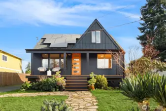 PNW foliage in your front and back yards that will light up in the Springtime! Covered front porch is divine!