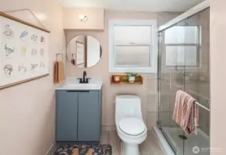 The second bathroom on the main floor sits just next to the bedroom.