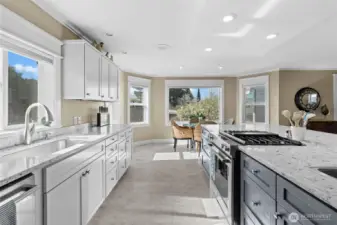 This kitchen has so much cabinetry, counter space and storage plus a gas range