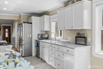 Bright and open kitchen with water views