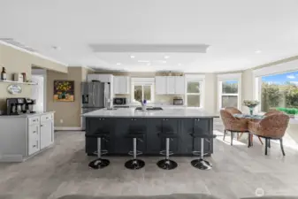 Kitchen has an abundance of storage, beautiful cabinetry and a walk-in pantry