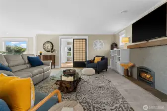 Living room with bonus room off the living area