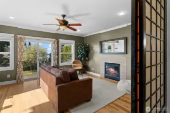 Large bonus room off the living room steps out to deck