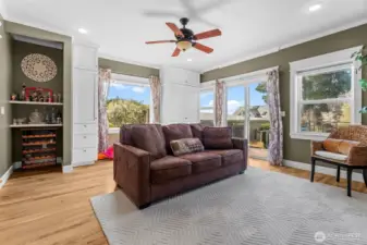 Bonus room off the living room with sliding doors to deck & yard