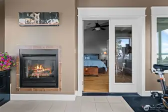 Bonus room off primary with fireplace and views of the water