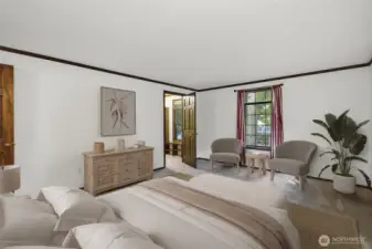 Primary bedroom with large walk-in closet and on-suite bathroom.