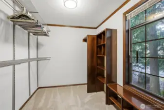 Primary closet with a window.