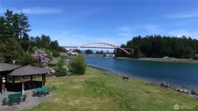 Swinomish Channel waterfront park with covered gathering area, picnic tables