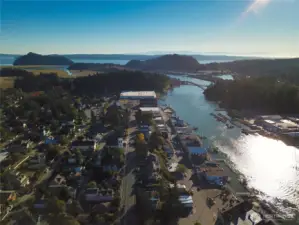 Arial View of La Conner, Rainbow Bridge and Shelter Bay Community and Marina upper right.