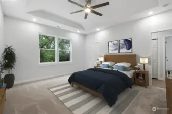 The Extra Large Primary Bedroom! Raised coffered ceiling with fan, walk in closet, lots of lights and natural light! Virtual Staged.