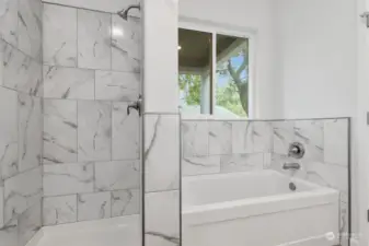 BEAUTIFUL custom tile work, soak away in your private bath.