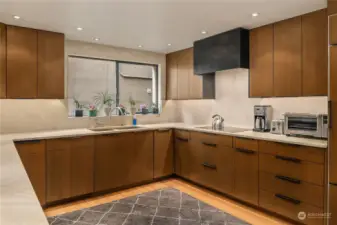 Kitchen with loads of built-in cabinetry.