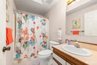 Guest Bath Sits Between Two Smaller Bedrooms