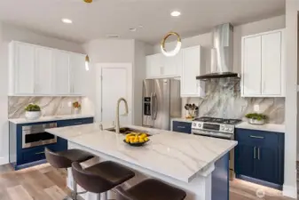 Stunning kitchen with the latest MSR finishes (Different unit, floor plan, & color scheme digitally staged)