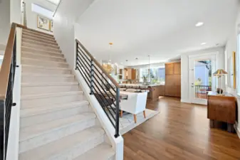 Sleek metal rail adds a touch of style and increases the visual square footage of the space.
