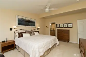 Light and airy primary bedroom offers a calm inviting retreat