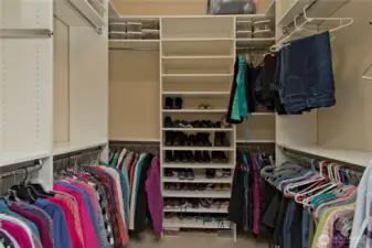 Primary bedroom walk-in closet