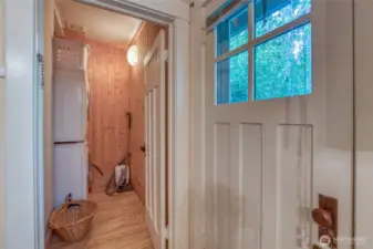 A lqundry room is located off of the kitchen and by the back door.