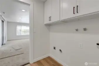 Handy laundry area off family room and kitchen