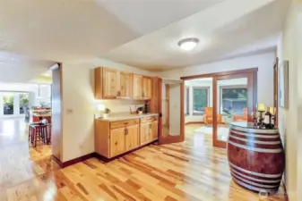 Additional kitchen storage, pantry overflow, back bar area.