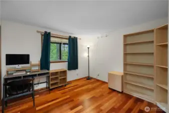 The 3rd main floor BR with nice wood floors, also...