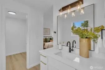 The bathroom connects directly to the primary bedroom, creating a convenient private suite layout.